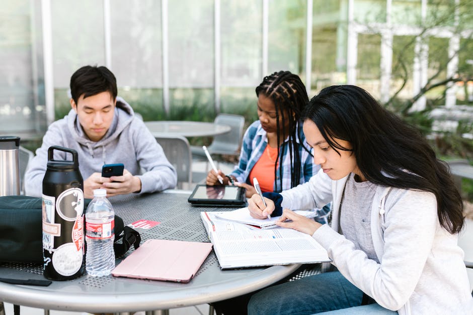 Image depicting a diverse group of college students studying together